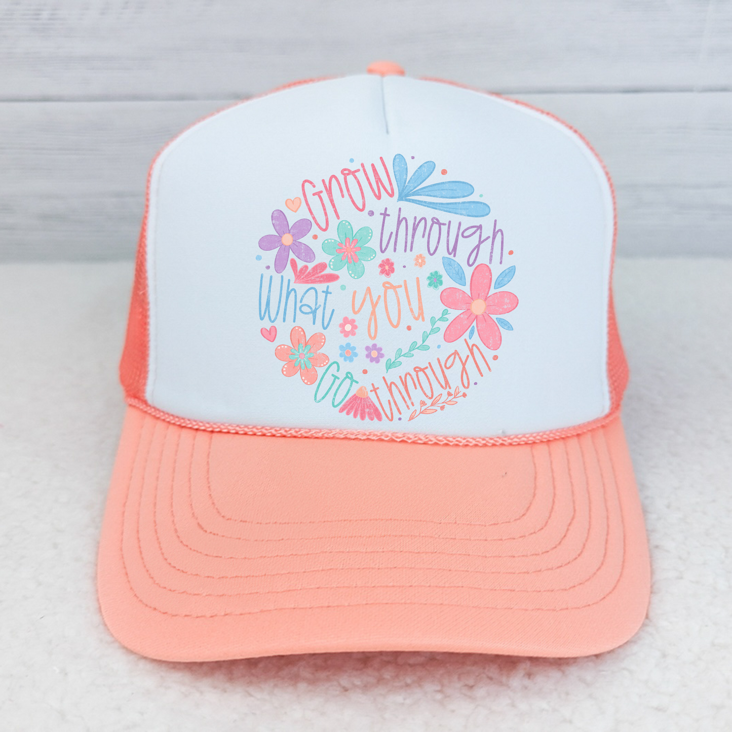 Grow through what you go through Trucker Hat