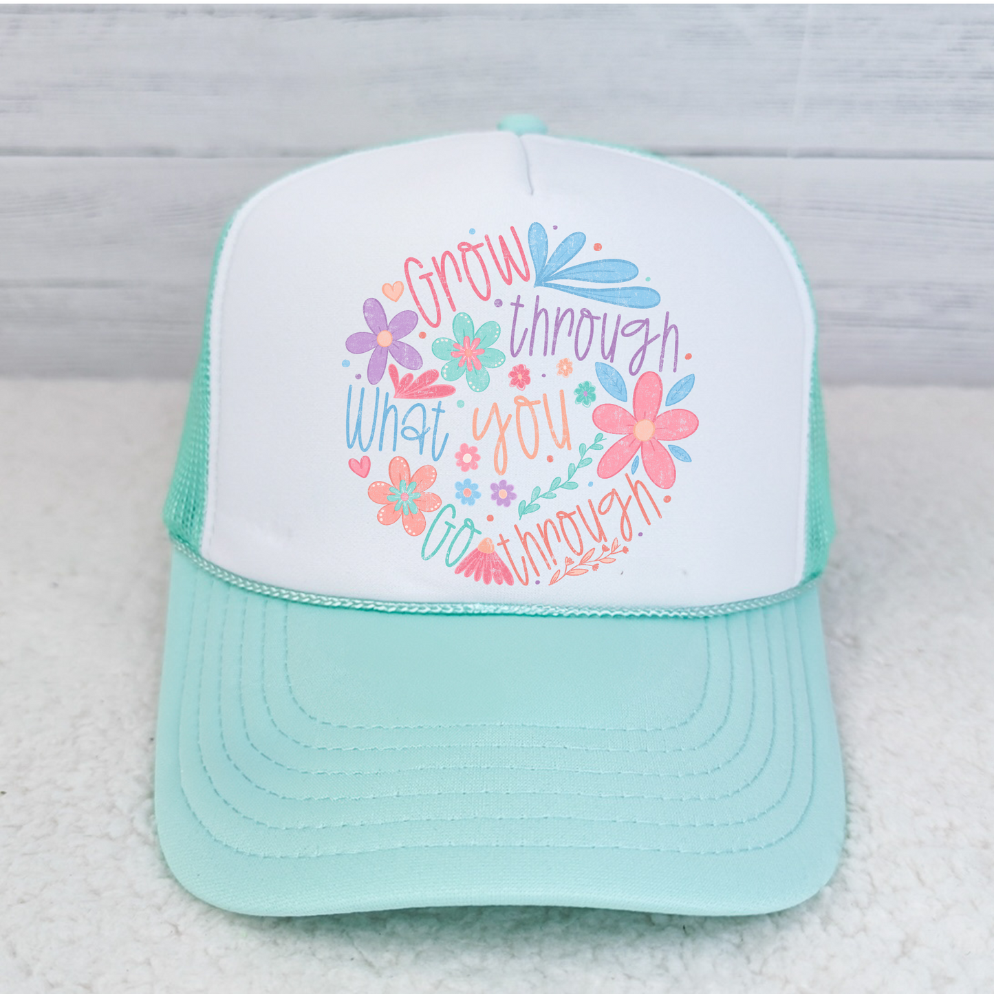 Grow through what you go through Trucker Hat